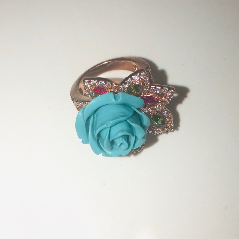 Turquoise blue ring with multicolored rhinestones